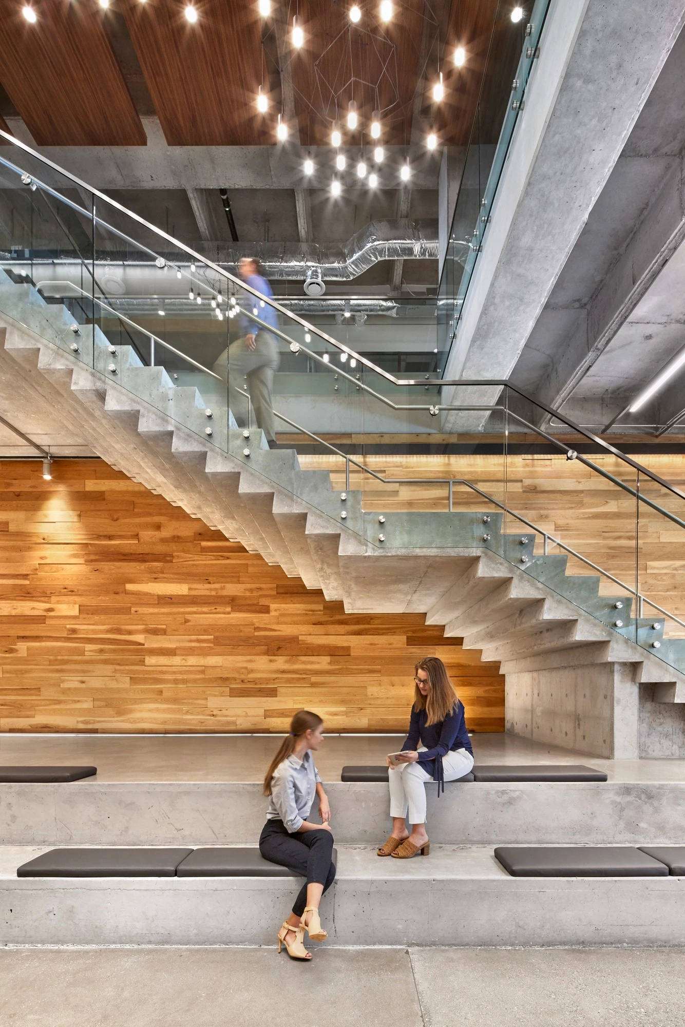 Saint John Paul II Academy — student commons staircase and meeting area